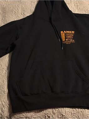 Source Unknown Black Hoodie with Orange Ramen Chest Print